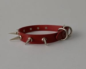 Bold red spiked collar for women made from Italian leather