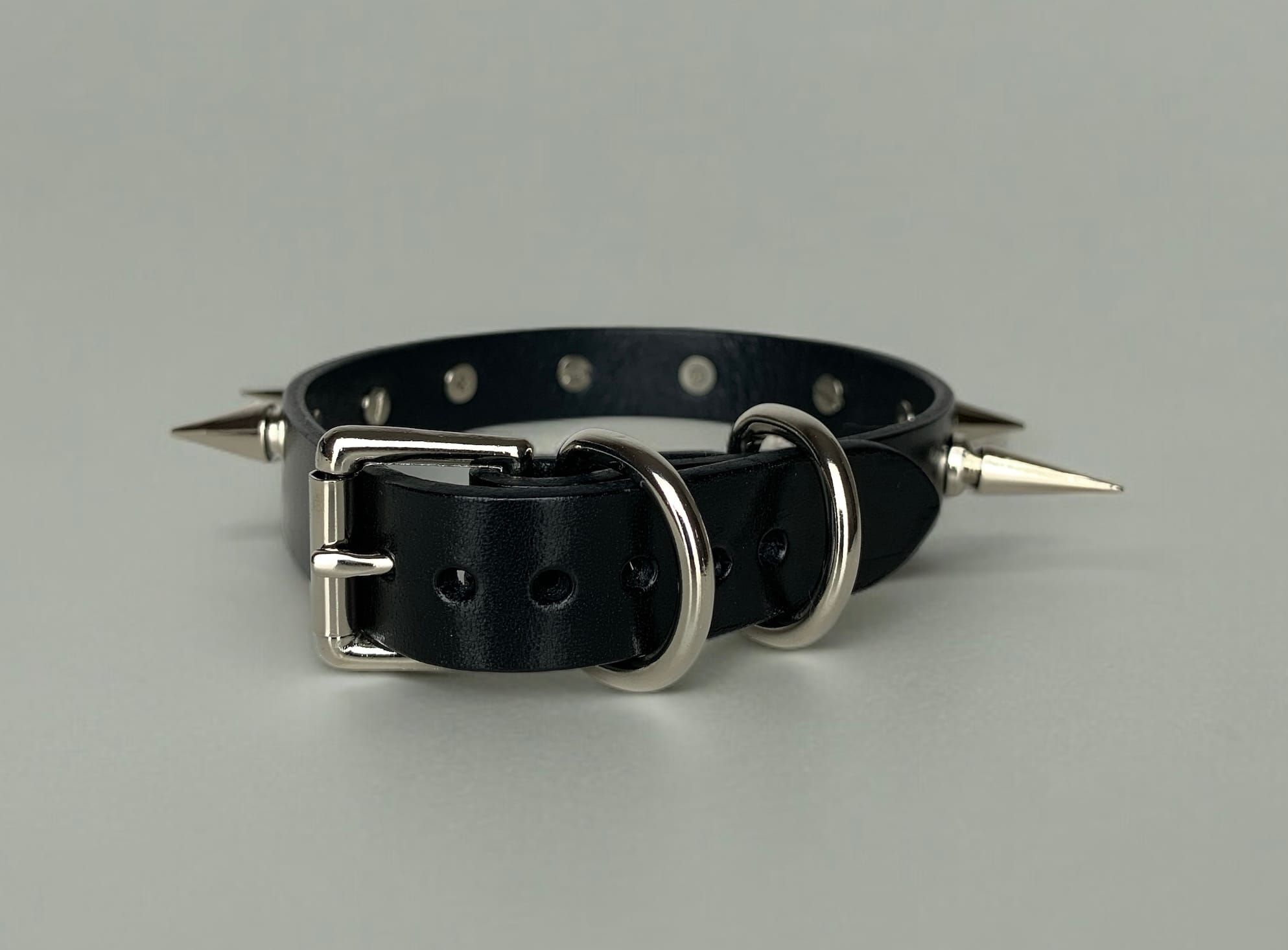 Submissive day collar featuring mixed-size spikes and premium craftsmanship